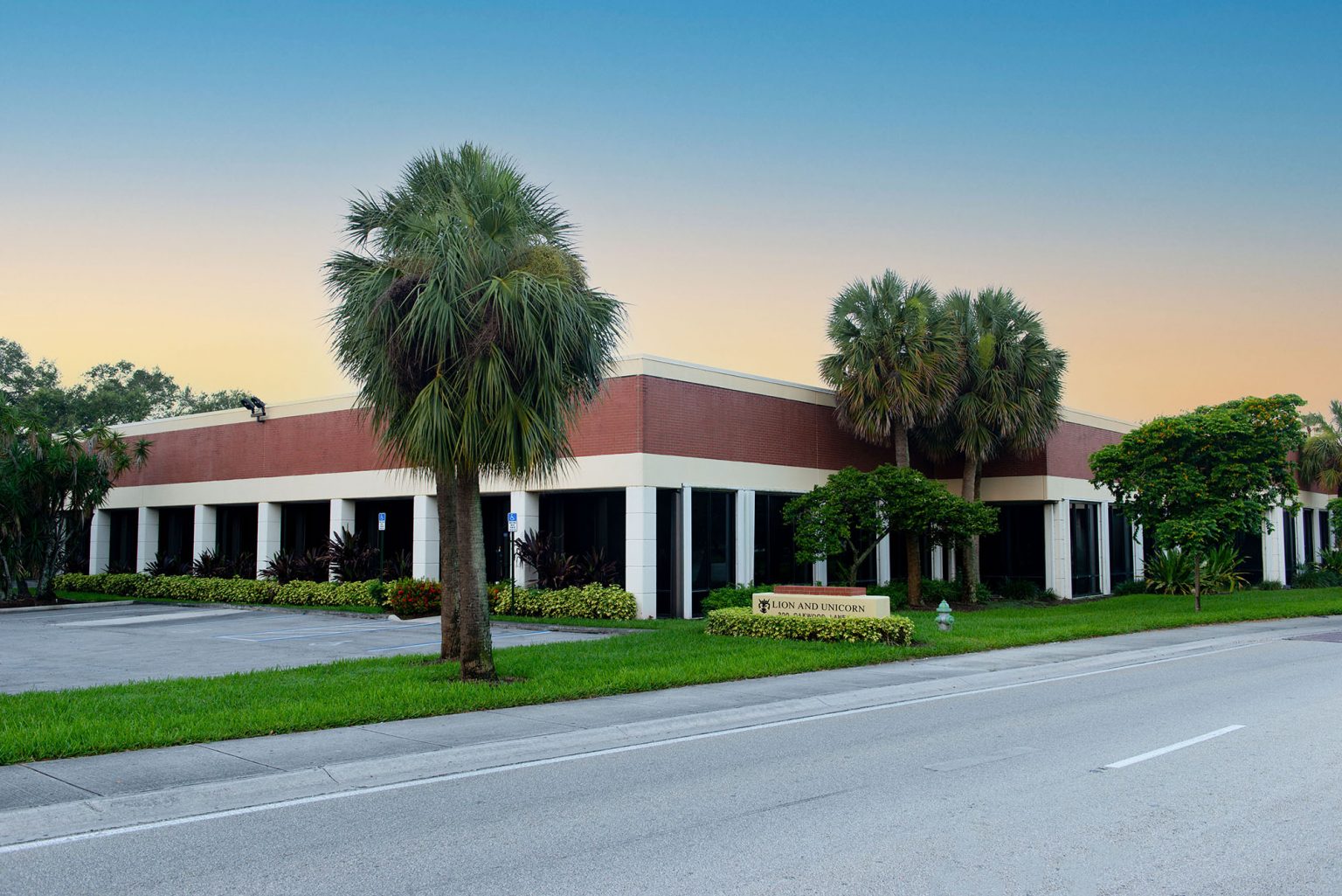 The Lion and Unicorn gallery building in Hollywood, Florida at sunset
