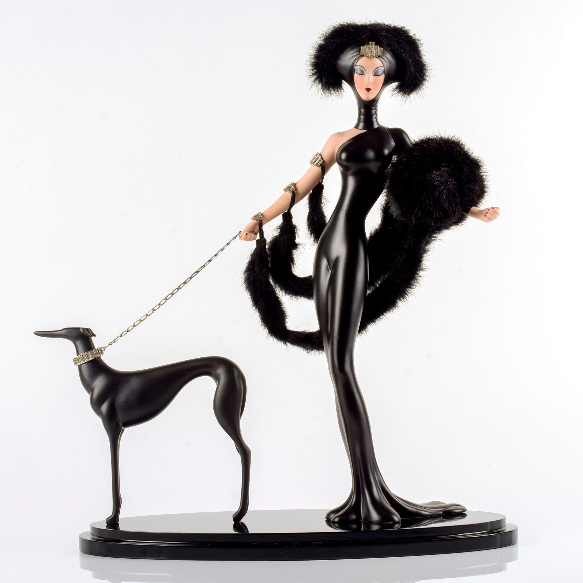 Image of an Erte Figurine with greyhound on a leash