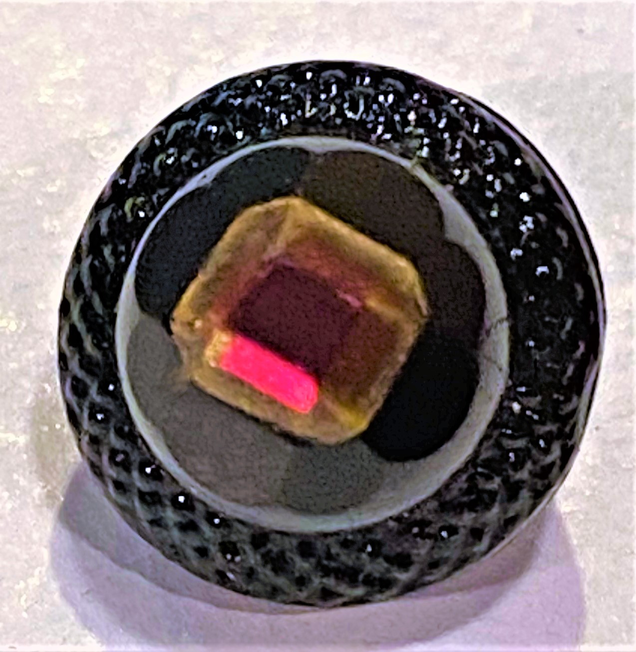 Rare black glass acorn tibgue button