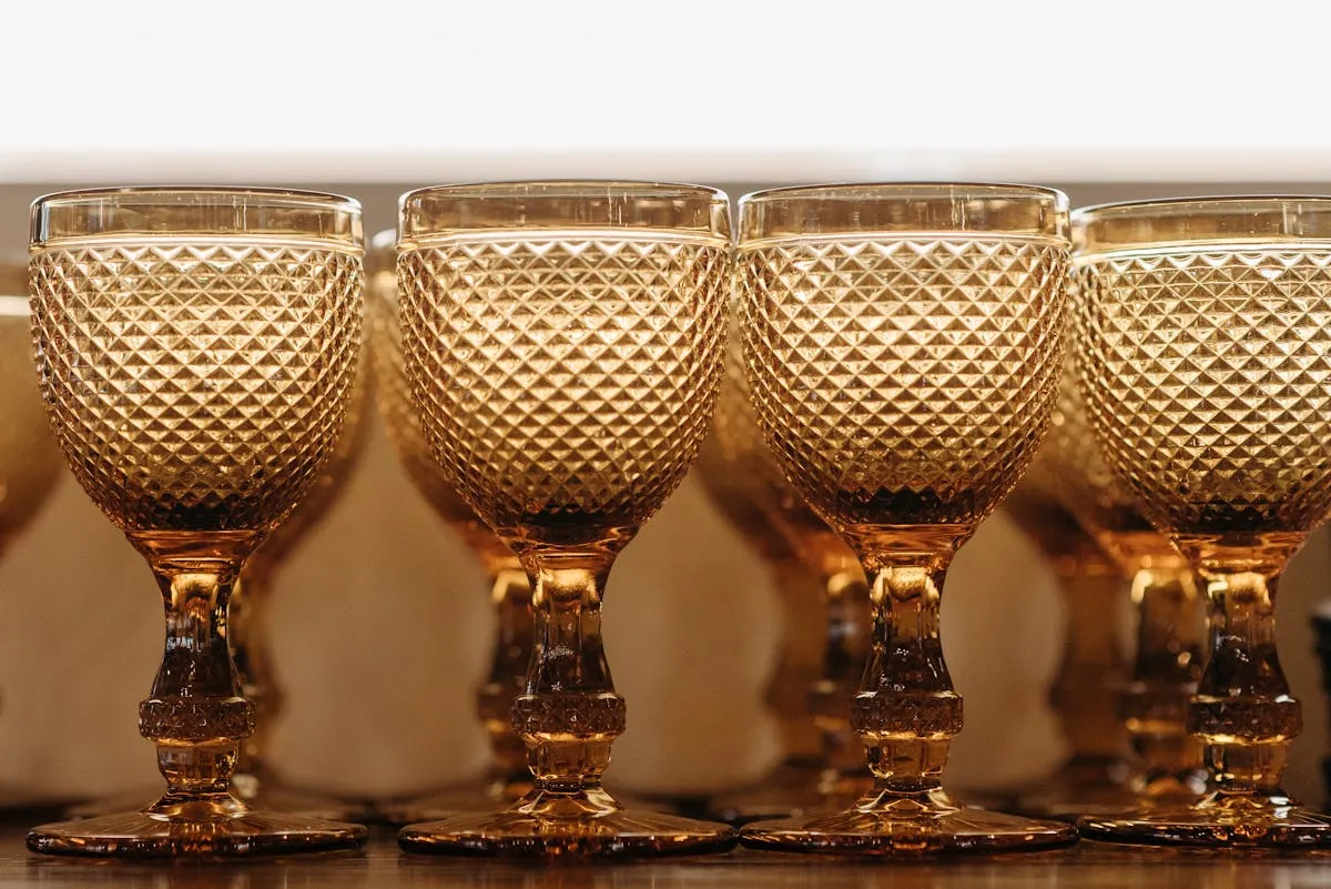 Collection of crystal glassware goblets showcasing clarity and light refraction of fine crystal