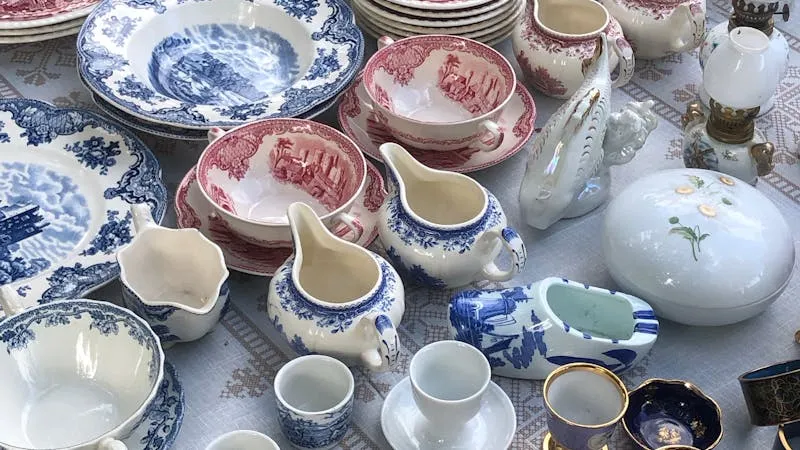 Close-up of vintage porcelain figurine showing the hand-painted details typical of authentic Hummel pieces