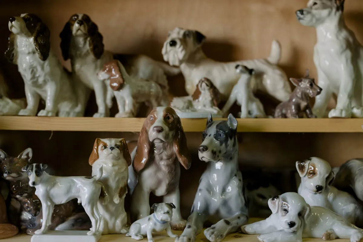Collection of porcelain figurines similar to Royal Doulton collectibles