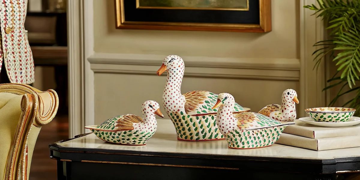Herend porcelain value guide with hand-painted fishnet figurines displayed for valuation