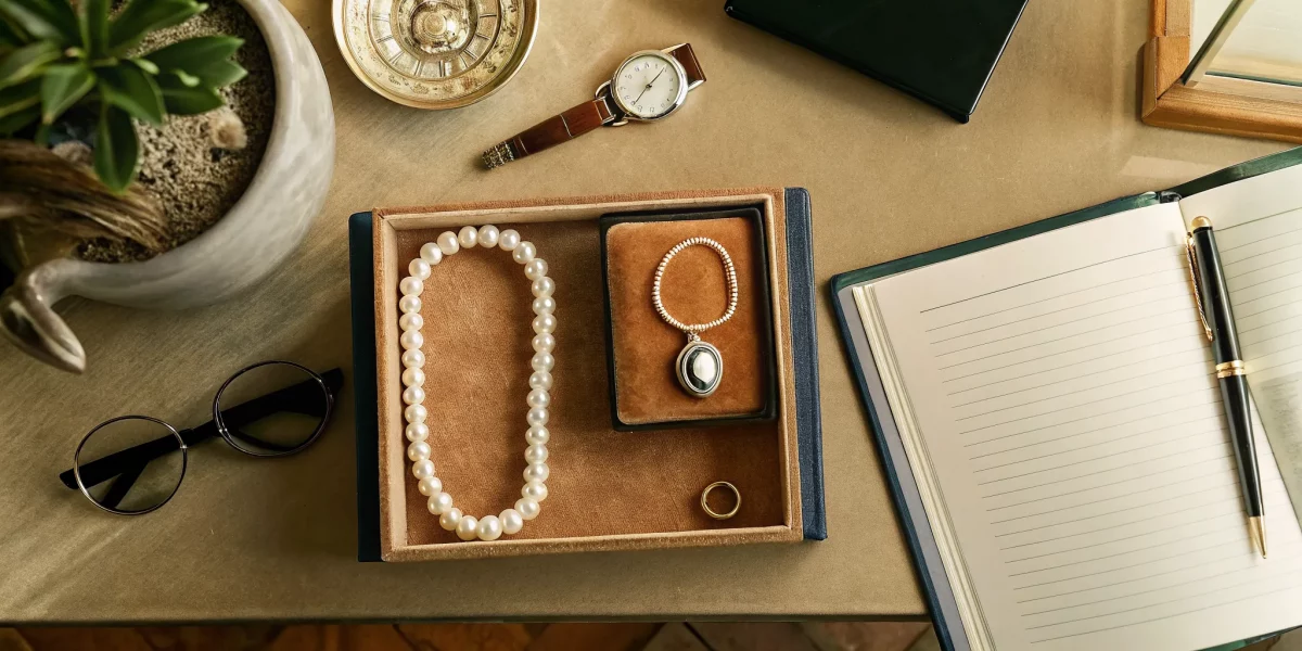 Family estate liquidation service sorting through jewelry and valuables.